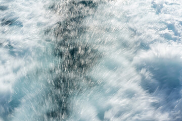 Sea water splash texture - blue transparent fresh ocean water background