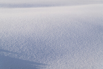 white snow, winter background of shining snow copy space
