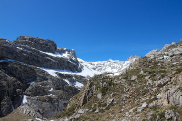 Fototapeta na wymiar Background of mountains with snowy peaks