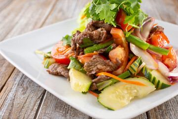 A view of pad gra prow, also known as Thai basil beef.