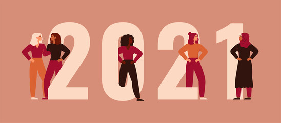 Strong women stand together near 2021. Happy new year banner with girls of different nationalities and cultures. Concept of feminism and female empowerment movement.