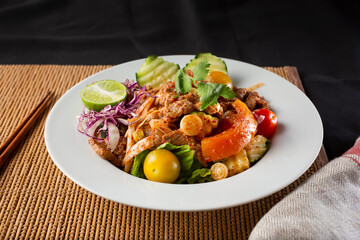 A view of a plate of marinated beef salad.
