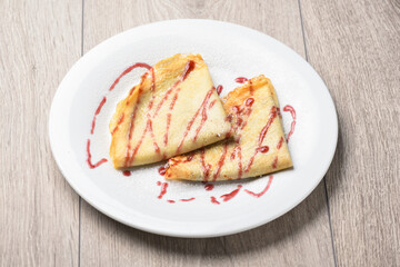 Strawberry panckaes on the plate