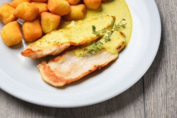 Grilled chicken fillets with potato crouqetes
