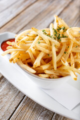 A view of an appetizer plate of french fries.
