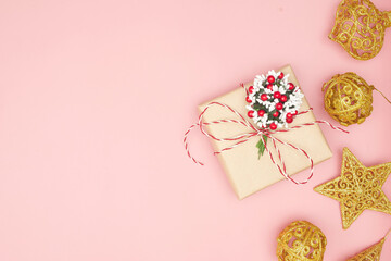 Obraz na płótnie Canvas Merry Christmas postcard banner, decorations on pink background, copy space