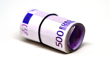 Roll of 500 euro money banknotes in rubber band