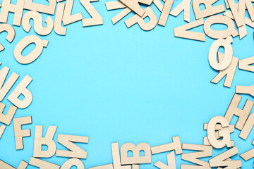 Wooden letters on blue background