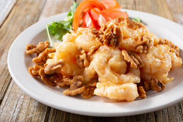 A view of a plate of honey walnut shrimp.
