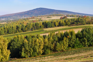 Rural landscape with view on Lysica mountain peak. Swietokrzyskie Mountains, Poland.