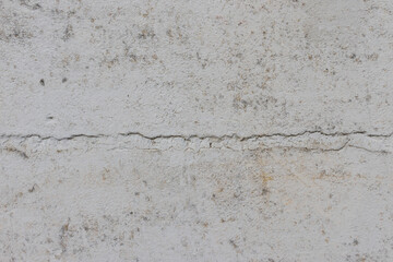 Obraz premium Old white wall with cracks, wallpaper