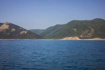 Republic of Crimea, Balaklava city Sea in the morning and mountains illuminated by the sun. Black Sea.