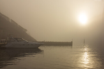 Republic of Crimea, city of Balaklava 07/14/2020: Sea port of the bay on a foggy morning.