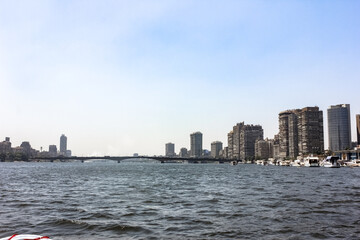 Fototapeta premium Egypt, Cairo - 05/05/2015: Walk around the city in the afternoon. Buildings and the Nile River.