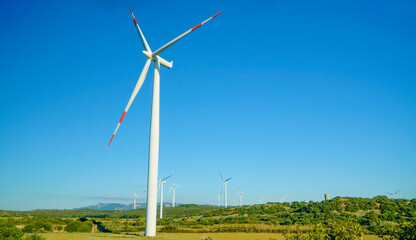 Wind turbine with beautiful blue sky. Eoliche, electricity. Portoscuso, south Sardinia 