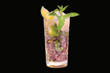 mojito alcoholic cocktail in a glass with ice and mint,