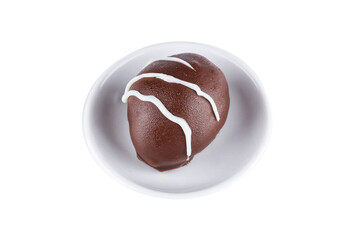 Chocolate truffle with green grape filling isolated on white background. Closeup photography.