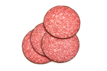 Peppered salami slices, isolated on white background