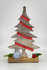Metal christmas tree on wood with silver 3D printed Corona virus