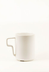white cup on white