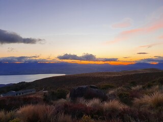 Fototapeta na wymiar sunrise over the mountains New Zealand Kepler