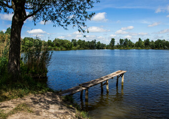 Fototapeta na wymiar Lake in the village