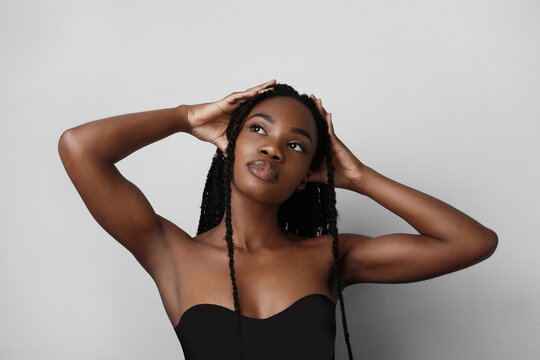 Beauty black skin woman. Young african american model with long hair. Isolated.