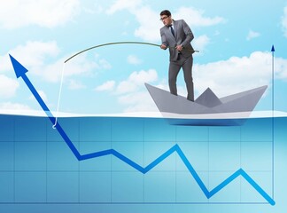 Businessman supporting economic growth with fishing rod