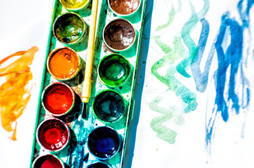  Sheet of paper and old watercolor paints