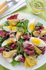 Artichoke and Boiled Egg Salad with Mixed Greens