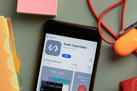 New York, USA - 28 September 2020: Koder Code Editor mobile app logo on phone screen close up, Illustrative Editorial