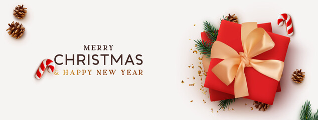 Christmas banner. Background Xmas design of realistic red gift box, 3d render pine branch and cone, sweet biscuit cane, gold confetti. Horizontal christmas poster, greeting card, headers for website