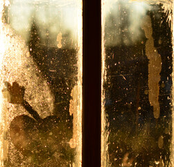 bright background of a blurred window with the evening sunbeams