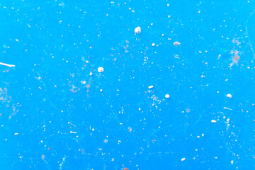 blue background with texture and various particles