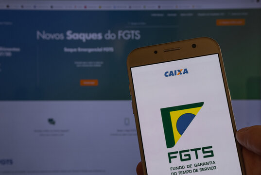 Brazilian FGTS application (time guarantee fund) with FGTS website in the background, Sao Paulo, Brazil - 17/09/2020