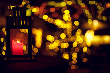 soft focus table lantern in Eastern church festive praying process with blurred background view of unfocused lamps yellow light