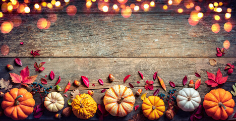 Thanksgiving Board - Wooden Table With Pumpkins And Lights