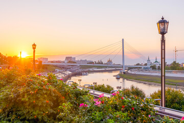 sunset on the quay of Tyumen in the summer