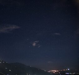 night sky with stars and clouds