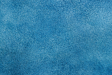 Texture of suede leather, genuine leather, blue color. Manufacturing and leather industry concept, background, copy space