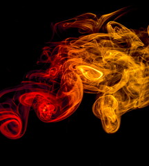 Colored smoke on black background