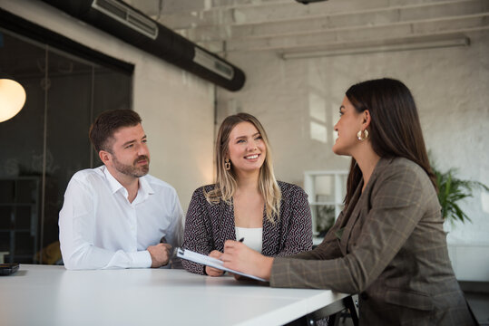Business people having small talk at the meeting