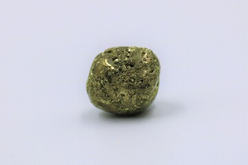 Pyrite stone on white background.