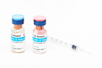 Bottles of new SARS-CoV-2 vaccine on table ready for application