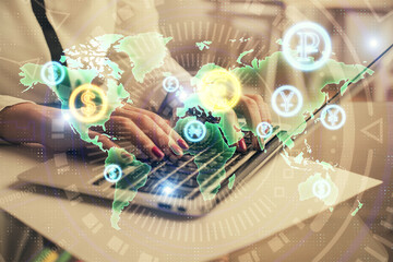 Multi exposure of woman hands typing on computer and financial graph hologram drawing. Stock market analysis concept.