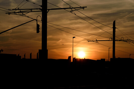 the sun sets over the city