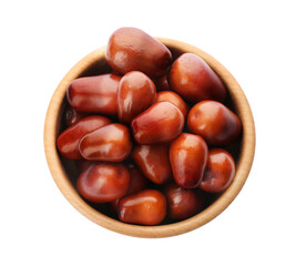 Fresh ripe oil palm fruits in bowl isolated on white, top view