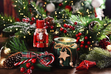 Christmas decoration with a candle and a nutcracker