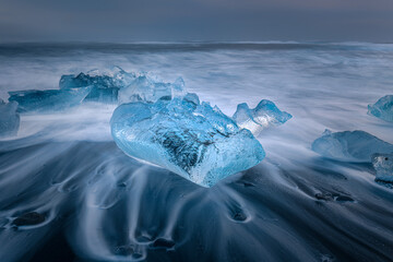 Natural Scenery of Diamond Beach with huge Ice in winter at dusk, Iceland