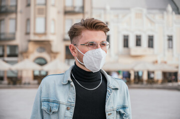 Man with glasses wearing a mask